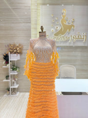 Orange dress, Beaded bodice, Frilly tulle skirt.